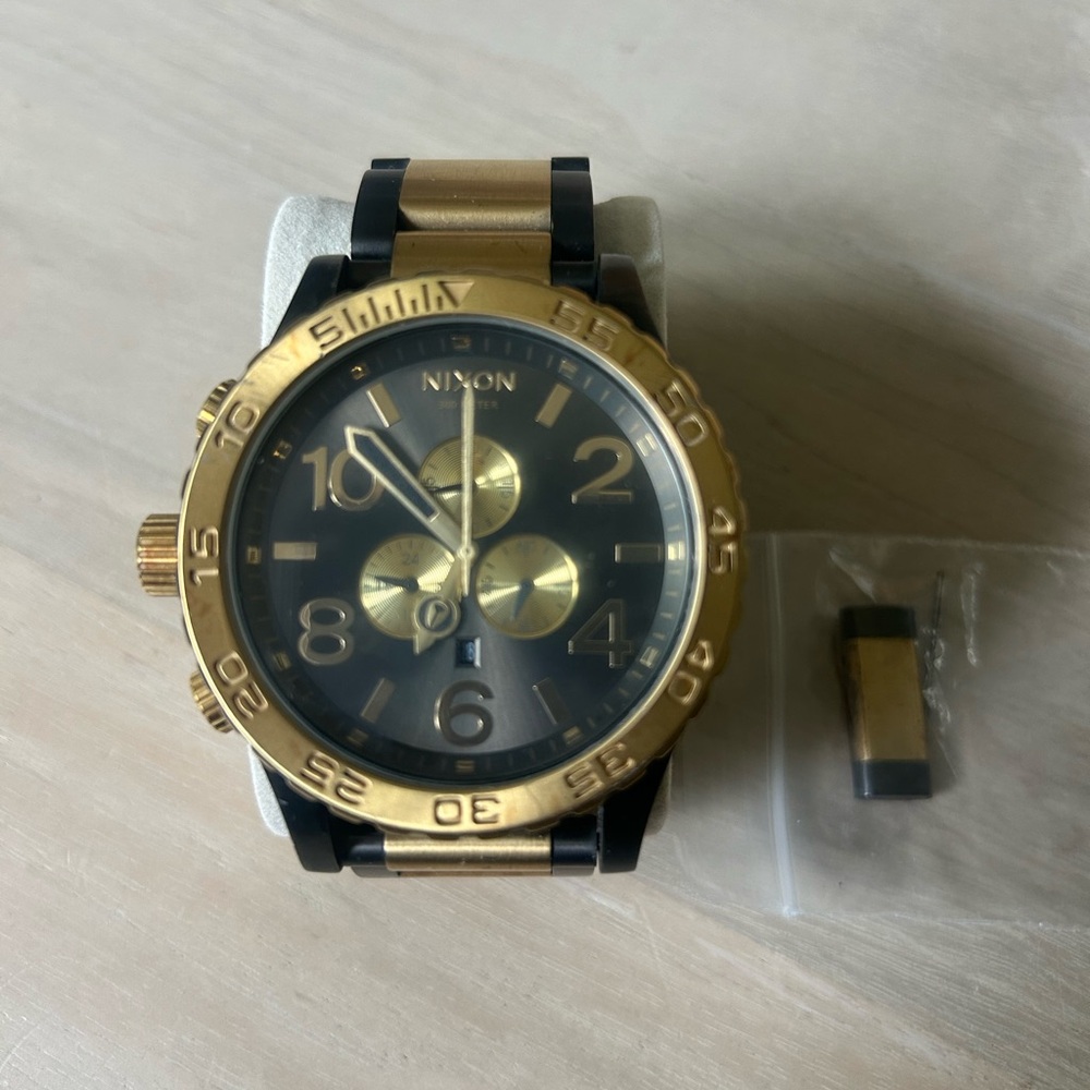 Nixon Gold and Black Chronograph Watch 51-30